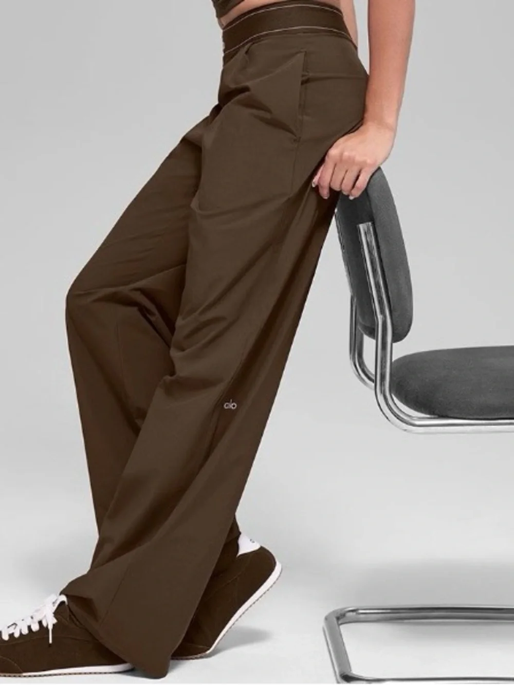 ALO Yoga female, espresso trousers.